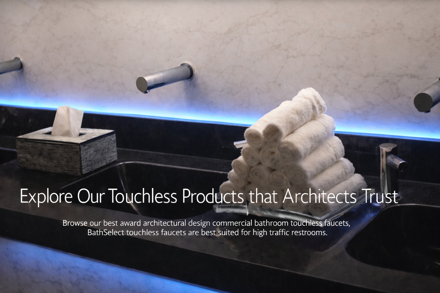 Class A office restroom sink line with touchless faucets and touchless soap dispensers